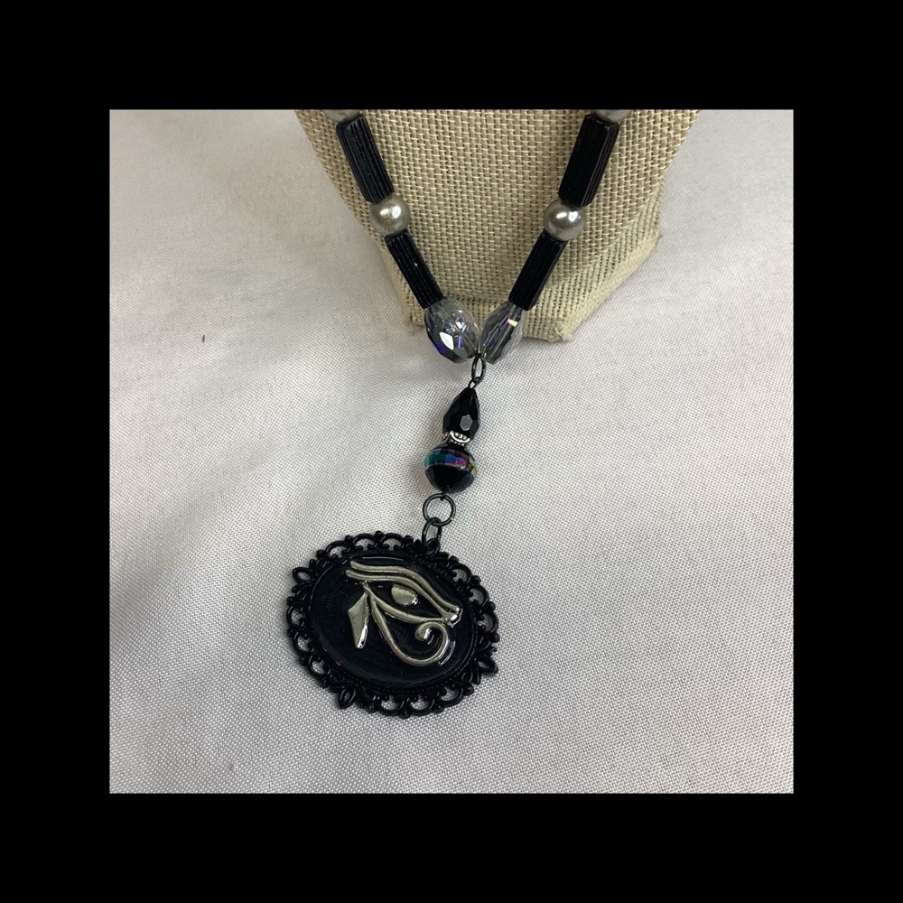 Egyptian eye of hours necklace.